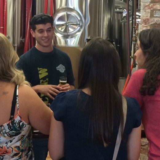 a group of people standing in front of a building