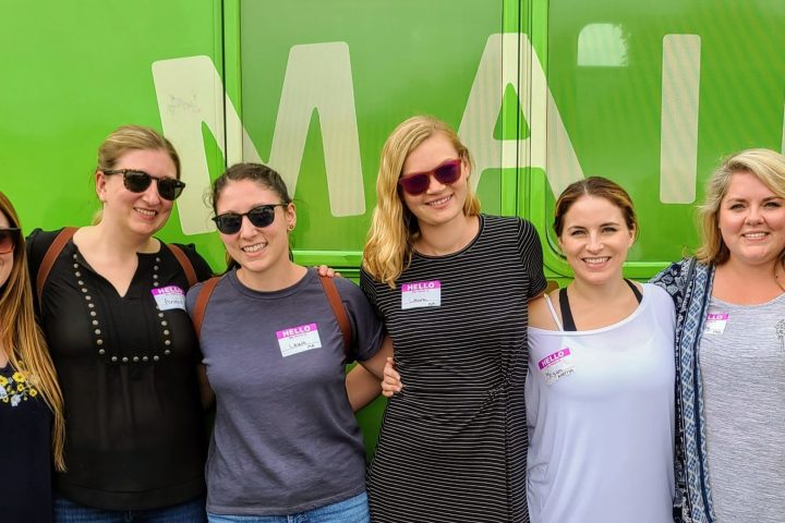 Kelly Alexander et al. posing for a photo