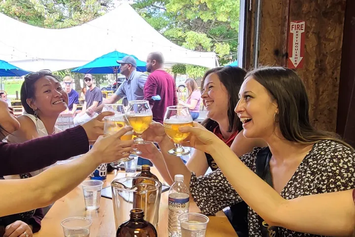 a group of people sitting at a table