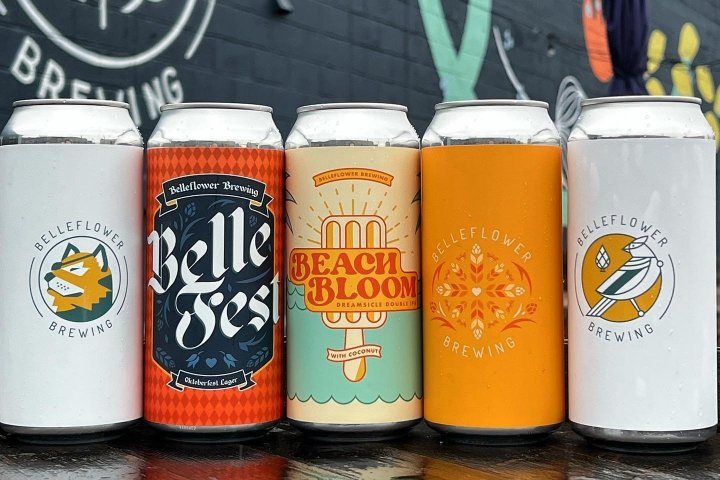 a can next to a cup of coffee