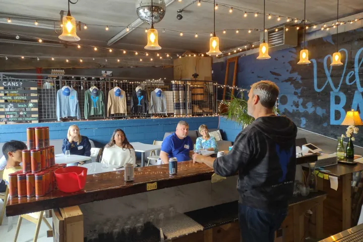 a group of people standing in a room