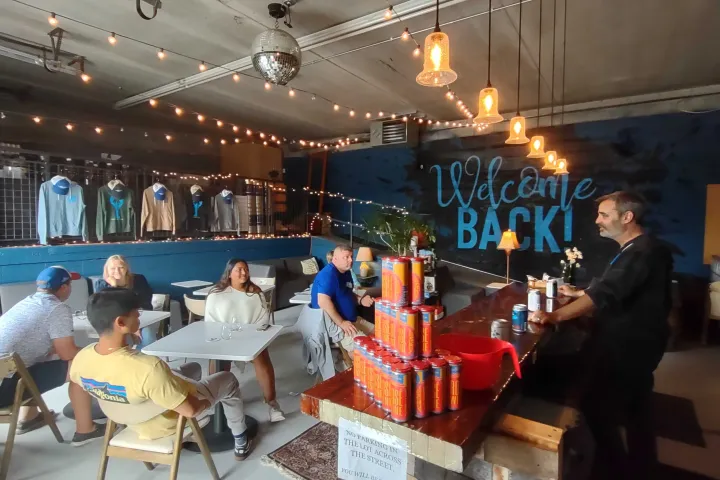 a group of people in a bar