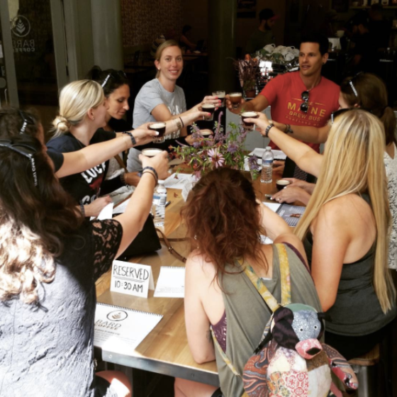 a group of people standing in front of a crowd