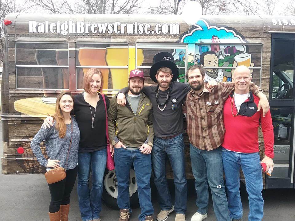 a group of people posing for the camera