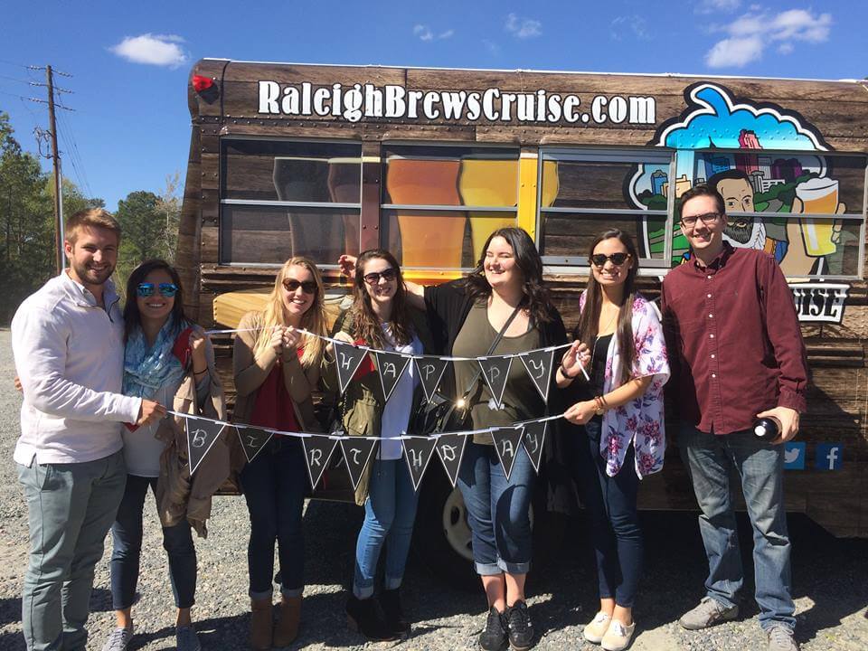 a group of people posing for the camera