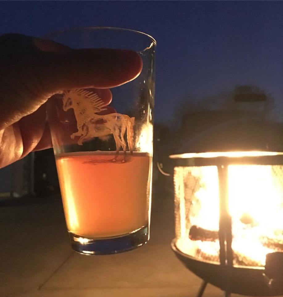 a glass of beer on a table