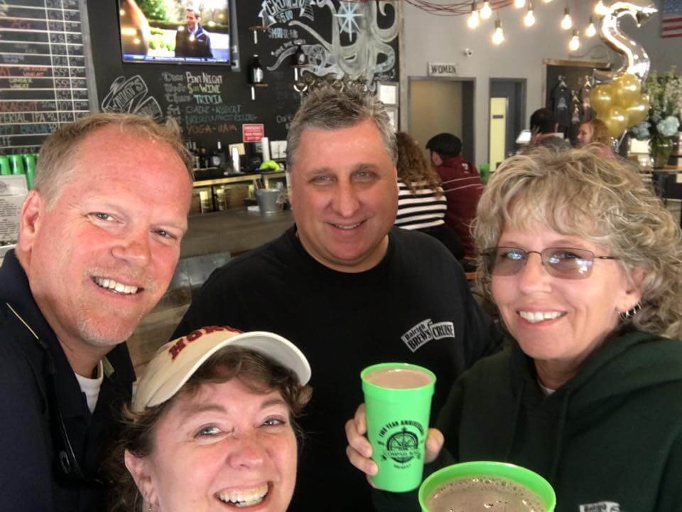 a group of people posing for the camera