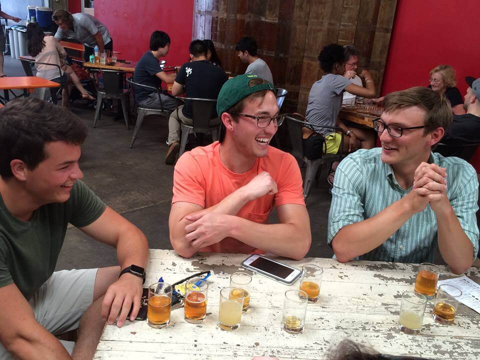 a group of people sitting at a table