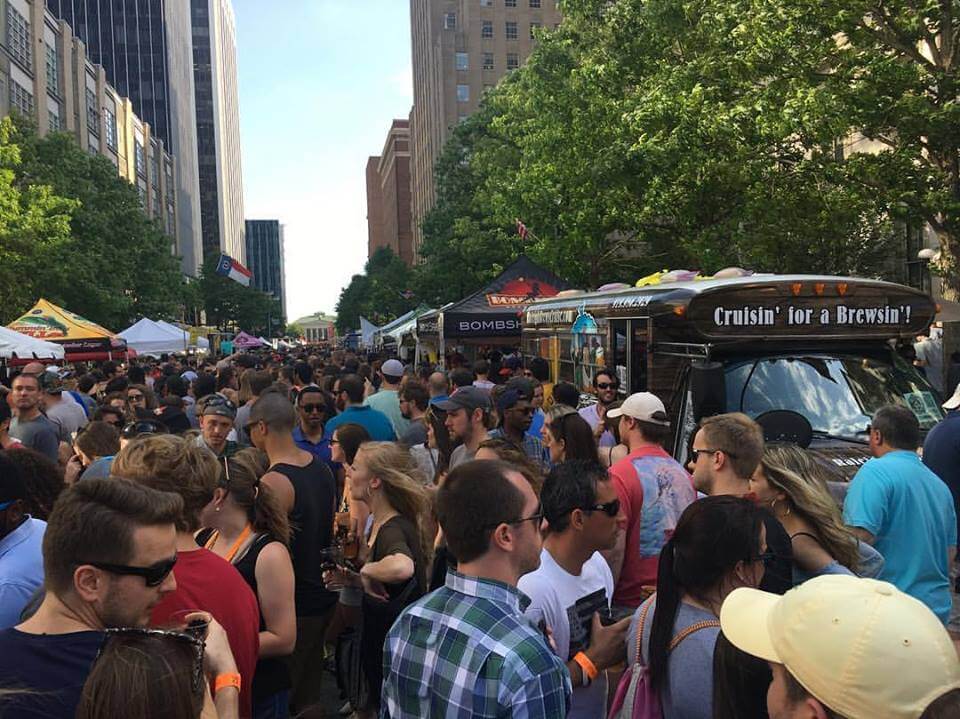 a group of people standing in front of a crowd