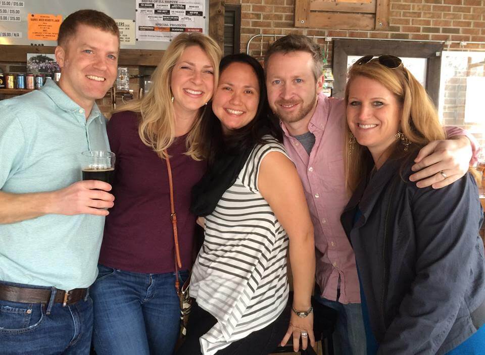 a group of people posing for a photo