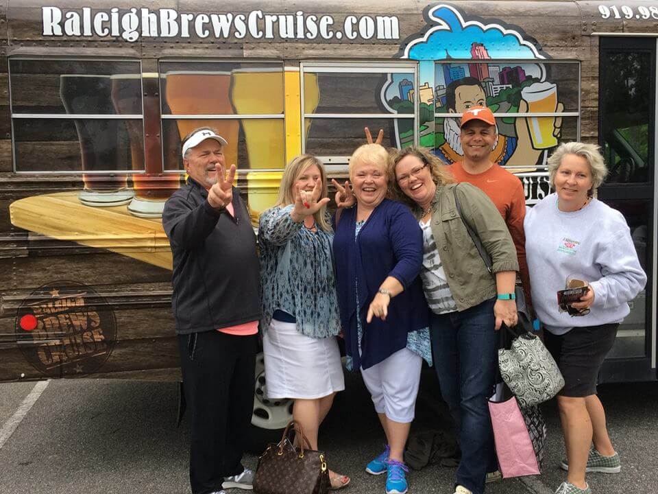 a group of people posing for the camera