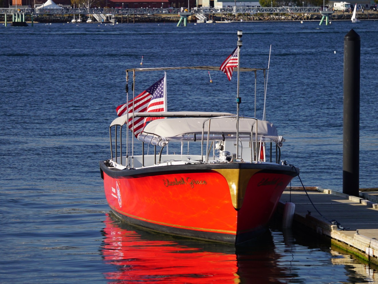 a small boat in a large body of water
