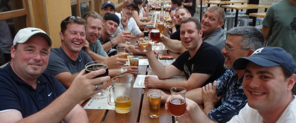 brewery tours usa a group of people sitting at a table in a restaurant