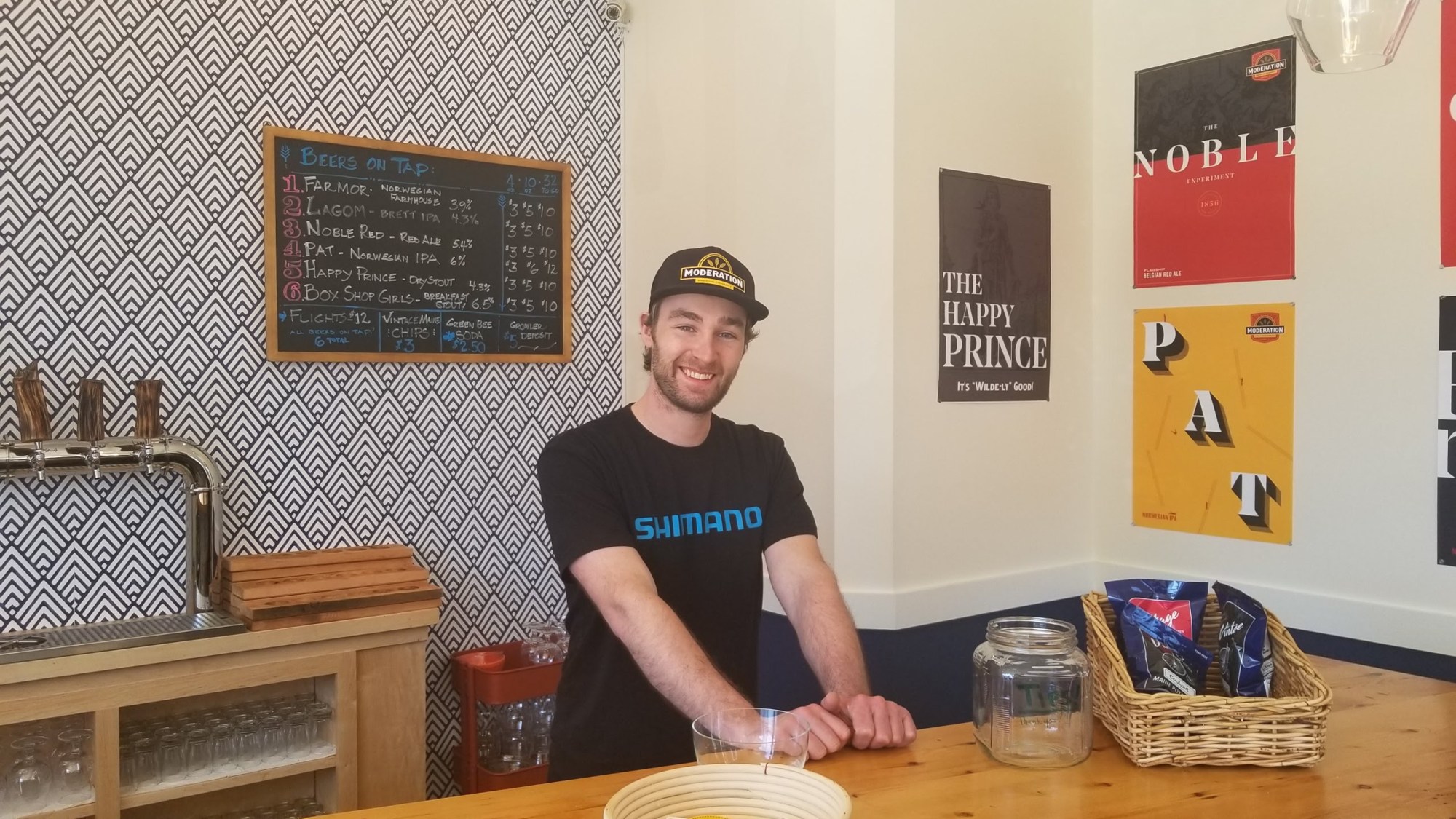 20180405_150526 a person sitting on a table