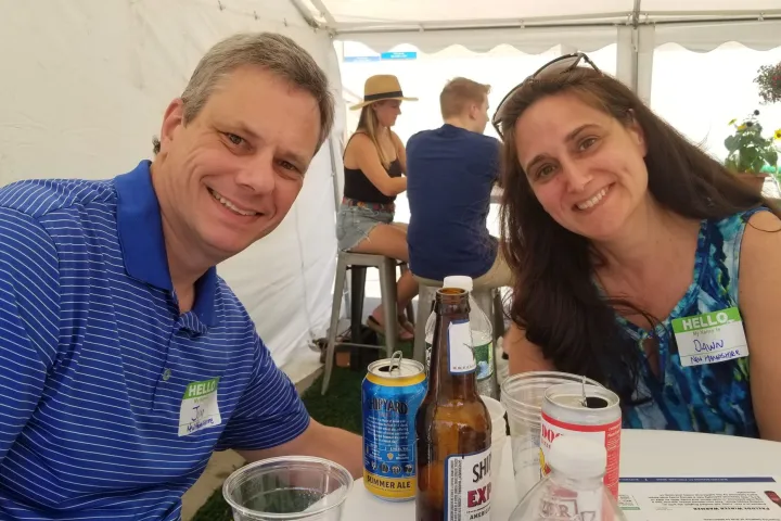 a couple of people that are sitting on a table
