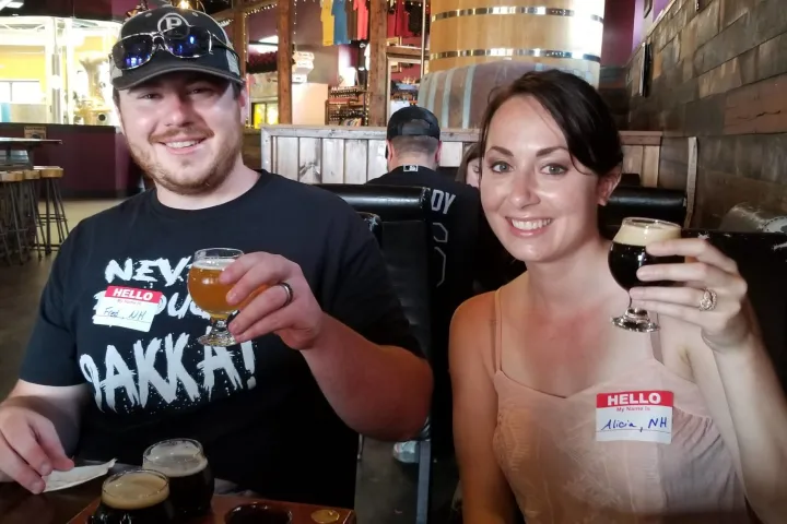 a woman sitting at a table in a restaurant