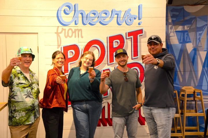 a group of people standing in front of a building