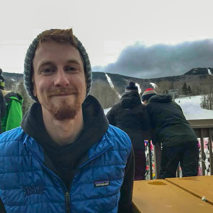 a man smiling for the camera