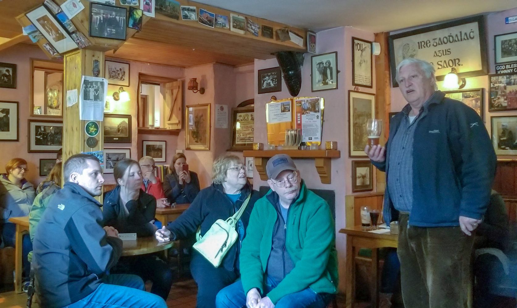 Farhatullah Babar et al. standing in a room