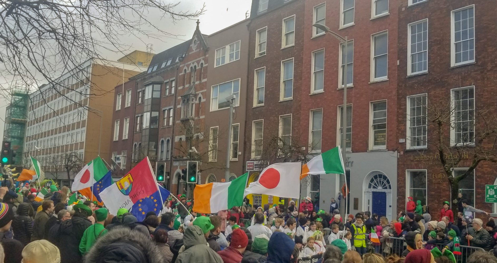 a group of people standing in front of a building