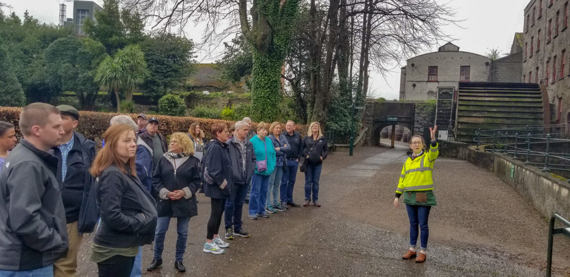 a group of people standing outside of a building