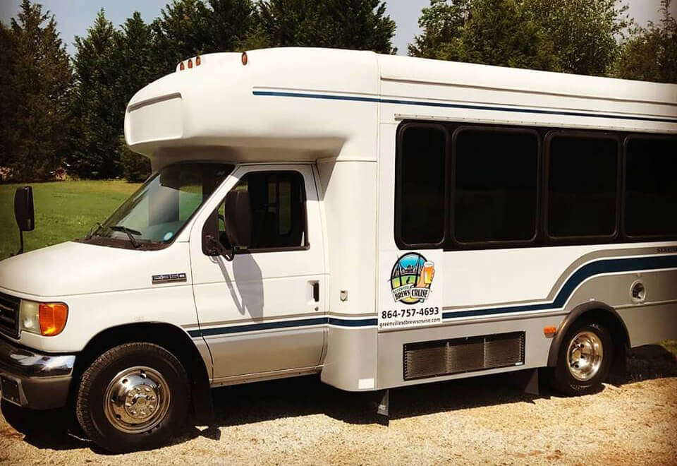 Greenville Brews Cruise a white van parked in a parking lot