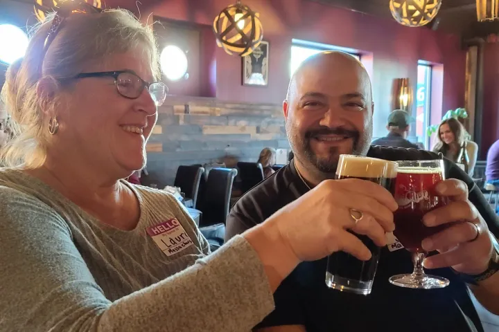 a person holding a glass of wine