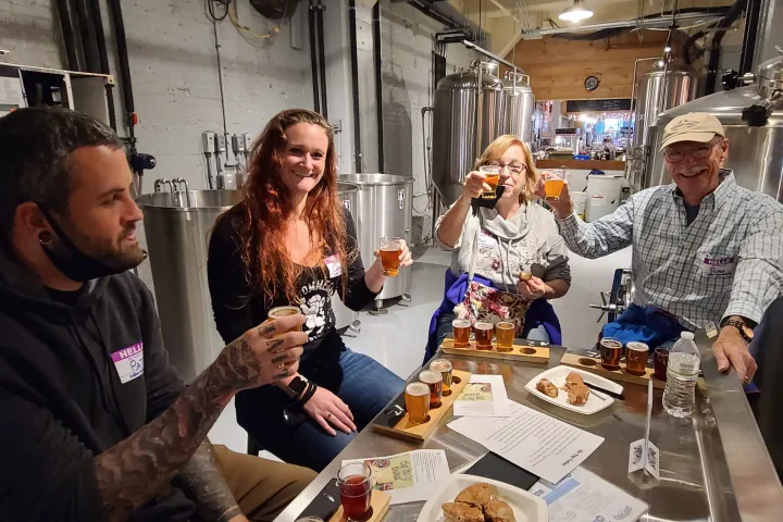 a group of people sitting at a table