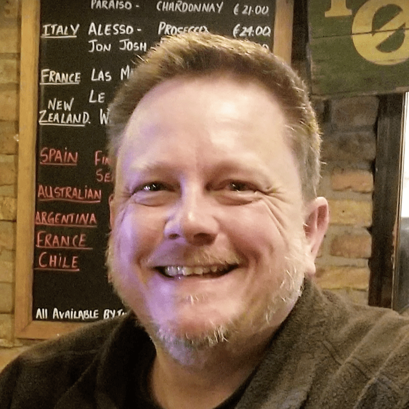 Don a man smiling for the camera