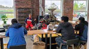 a group of people sitting at a table