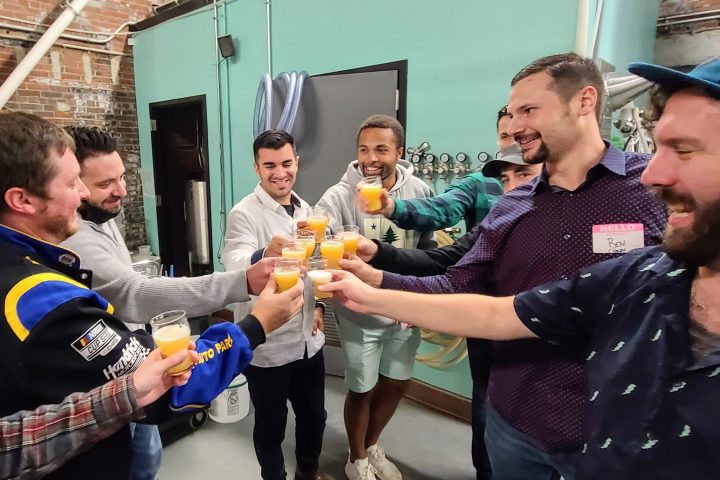 a man holding a hot dog