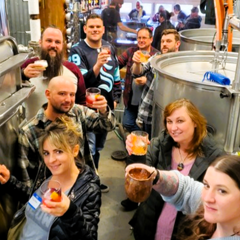 a group of people around each other