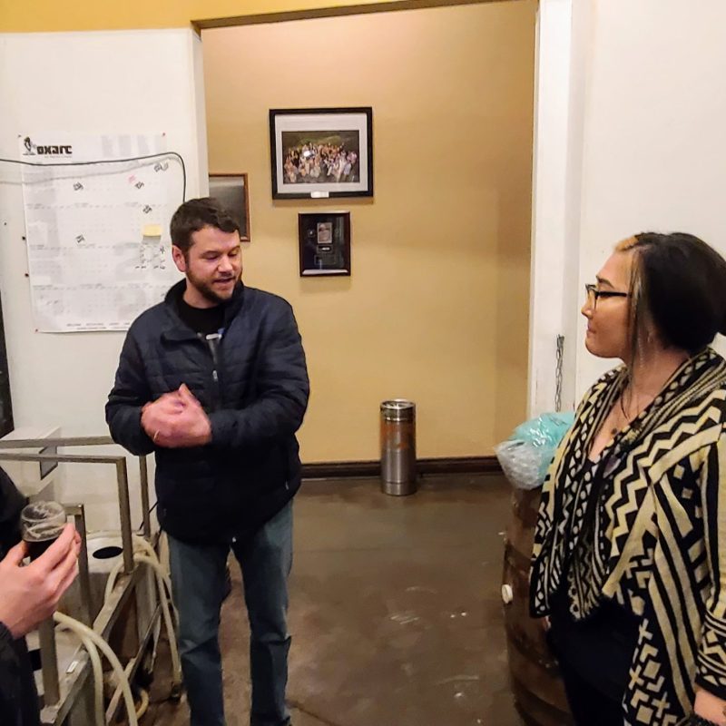 a man and a woman standing in a room