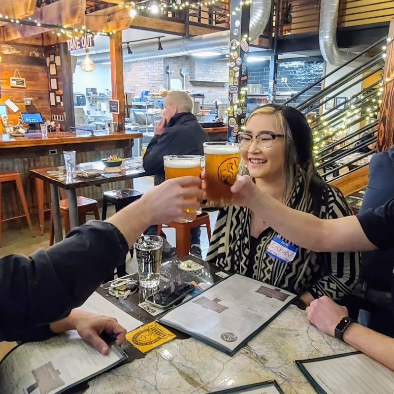 a group of people sitting at a table