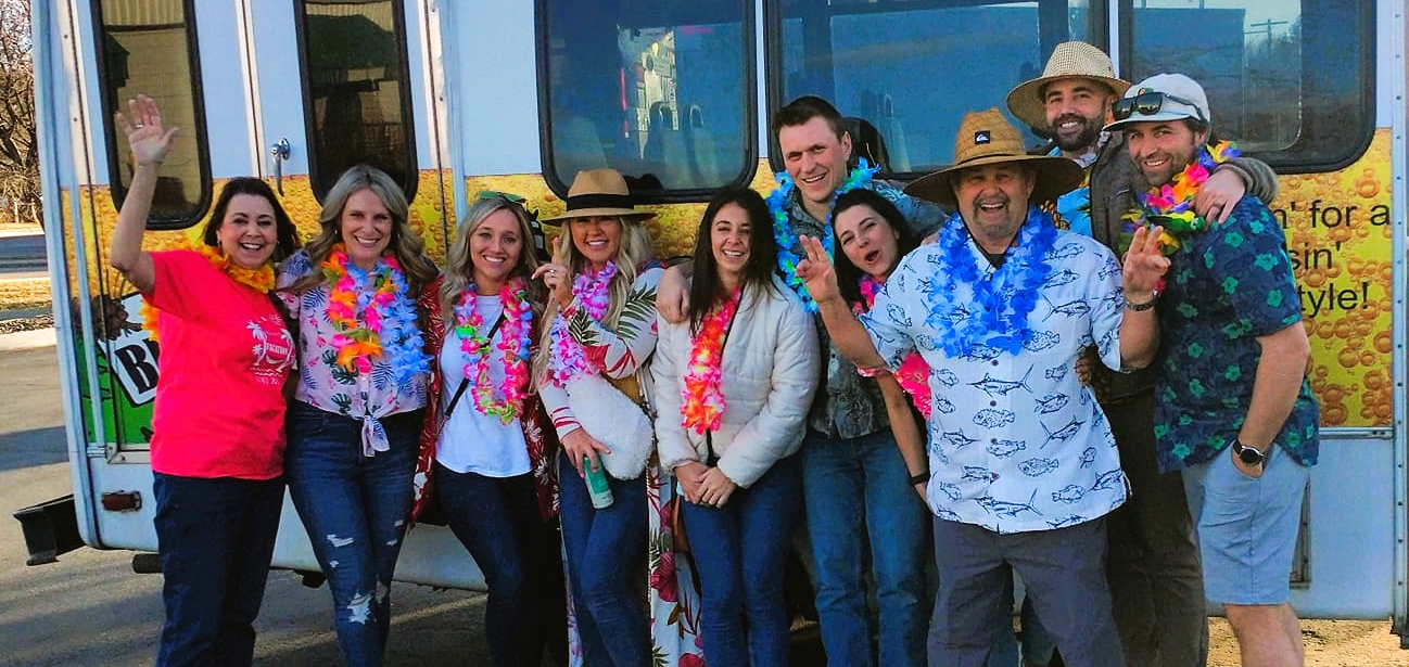 a group of people posing for a photo