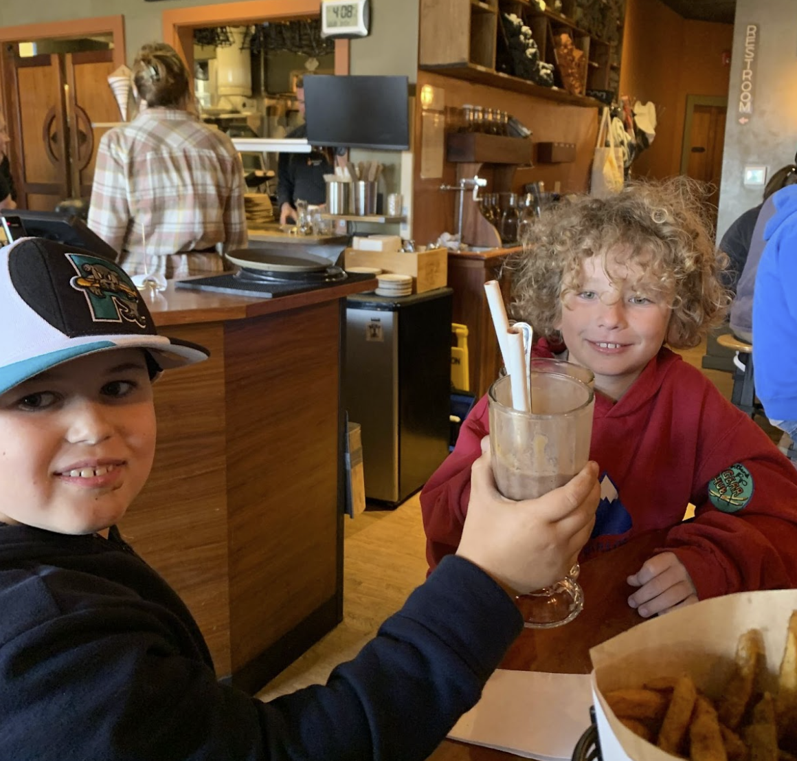 Screenshot 2022-11-01 130303 a little boy that is eating some food