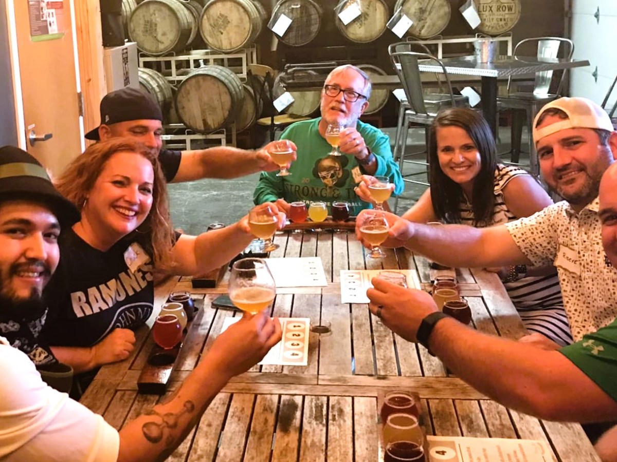 a group of people sitting at a table