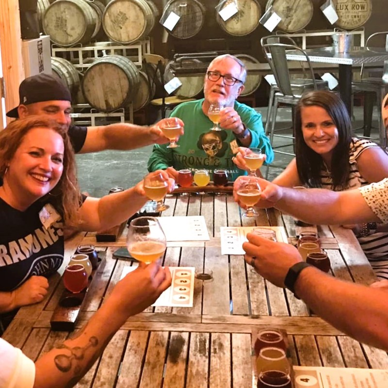 a group of people sitting at a table