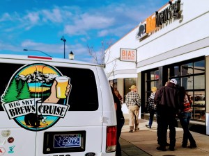 a man standing in front of a bus