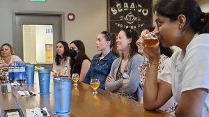 a group of people sitting at a table