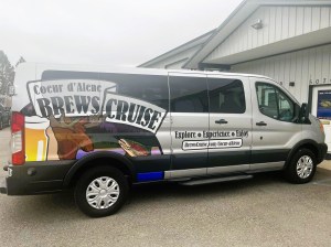 a car parked in front of a truck