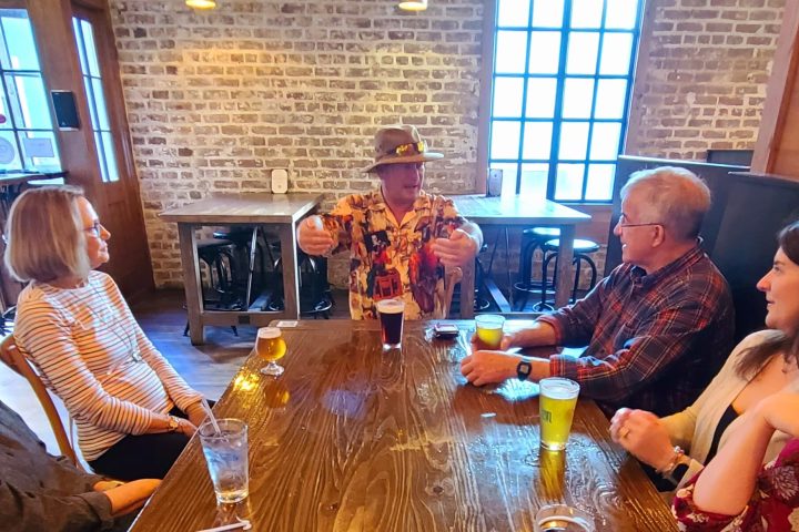 a group of people sitting at a table