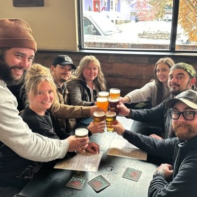 a group of people sitting at a table