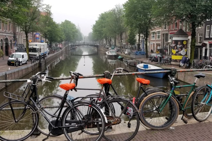 a bicycle parked on the side of a building