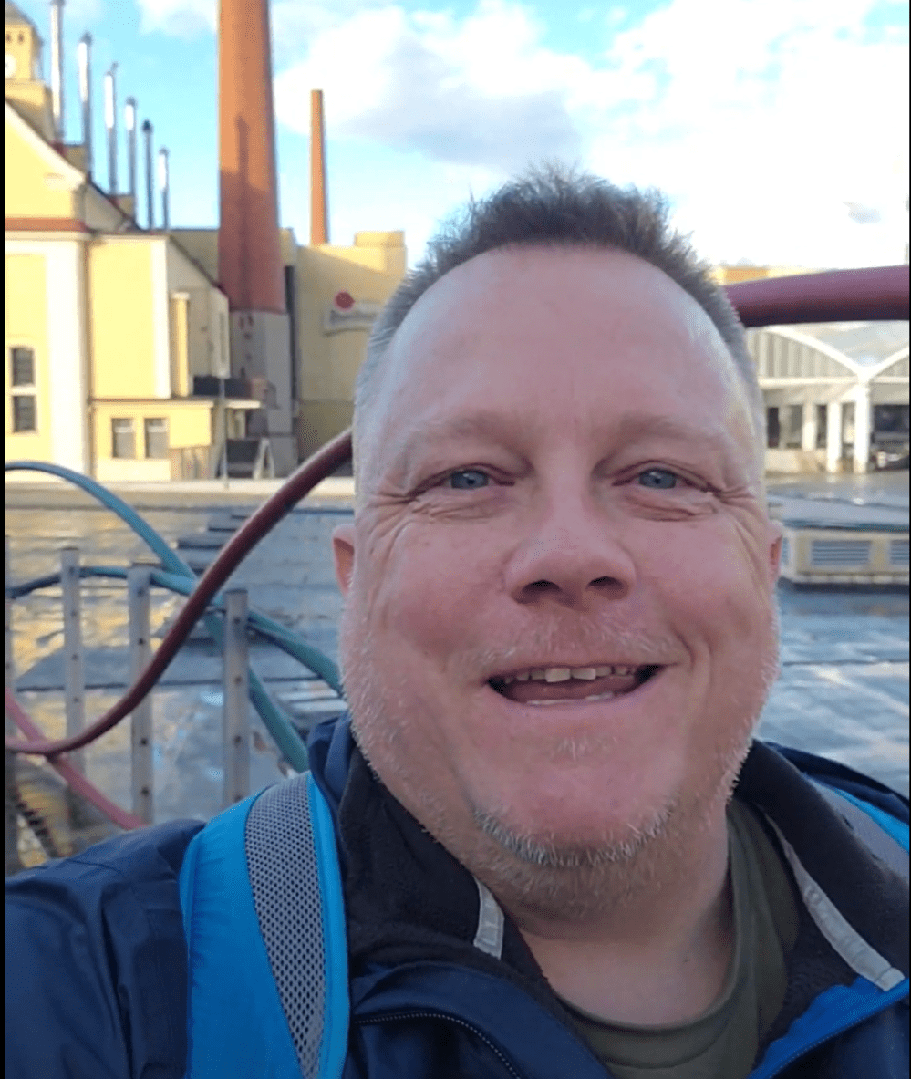 Don taking a selfie in front of Pilsner Urquell in Pilsen, Czechia